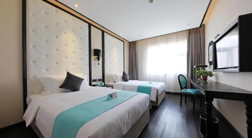 Bed in Xana Hotelle·Tianshui Shangyi Plaza