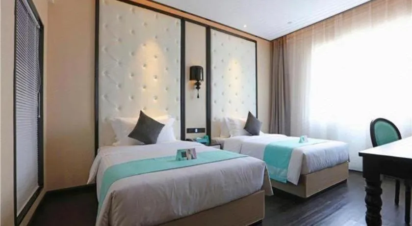 Bed in Xana Hotelle·Tianshui Shangyi Plaza