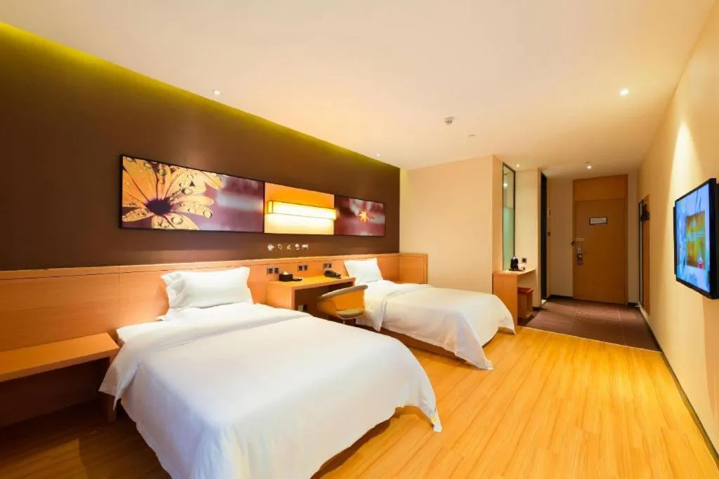 Bed in IU Hotel·Tianjin Binhai New District Yanghuo Market