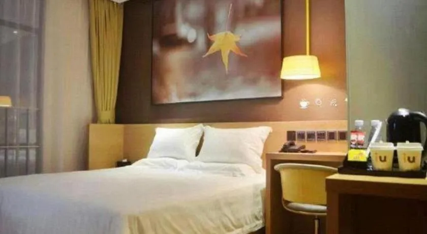 Bed in IU Hotel·Tianjin Binhai New District Yanghuo Market