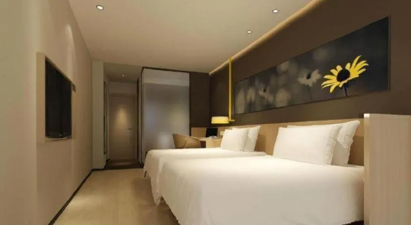 Bed in IU Hotel·Tianjin Binhai New District Yanghuo Market