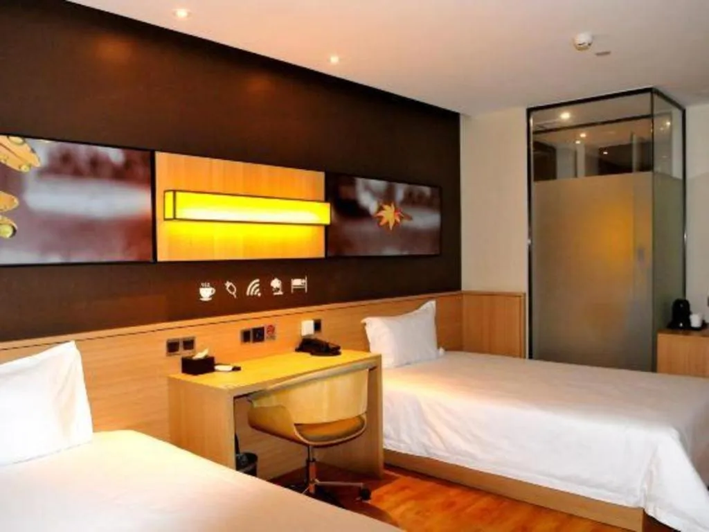 Bed in IU Hotel·Tianjin Binhai New District Yanghuo Market