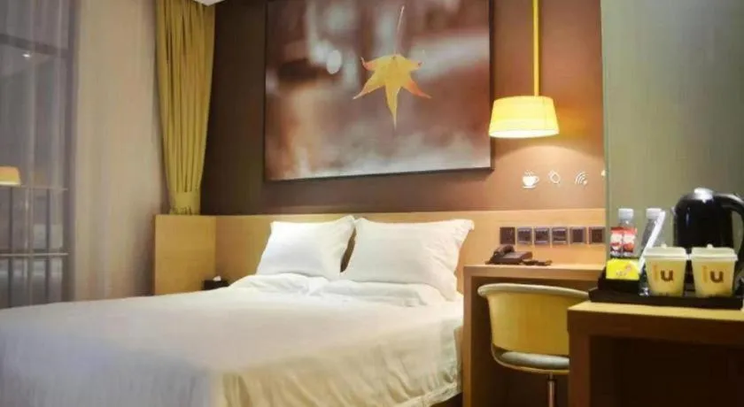 Bed in IU Hotel·Tianjin Binhai New District Yanghuo Market