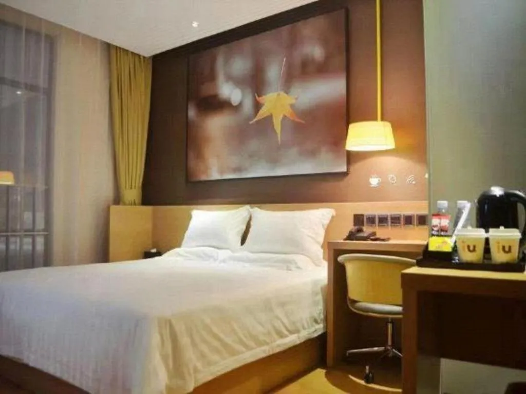 Bed in IU Hotel·Tianjin Binhai New District Yanghuo Market