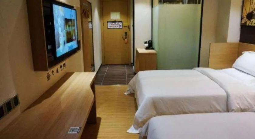 Bed in IU Hotel·Tianjin Binhai New District Yanghuo Market