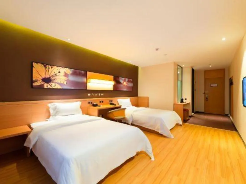 Bed in IU Hotel·Tianjin Binhai New District Yanghuo Market