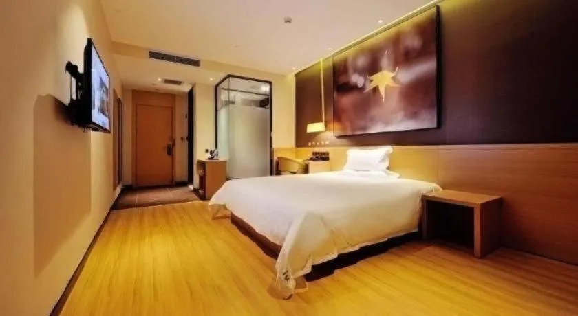 Bed in IU Hotel·Tianjin Binhai New District Yanghuo Market