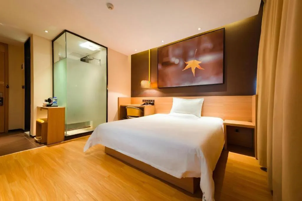 Bed in IU Hotel·Tianjin Binhai New District Yanghuo Market