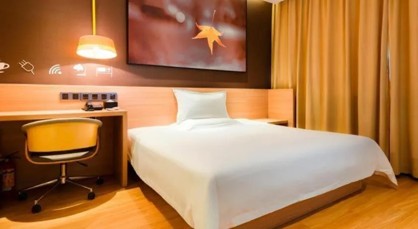 Bed in IU Hotel·Tianjin Binhai New District Yanghuo Market