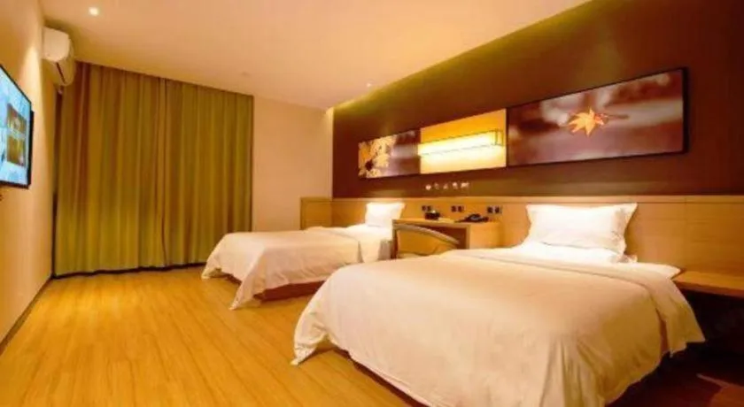 Bed in IU Hotel·Tianjin Binhai New District Yanghuo Market