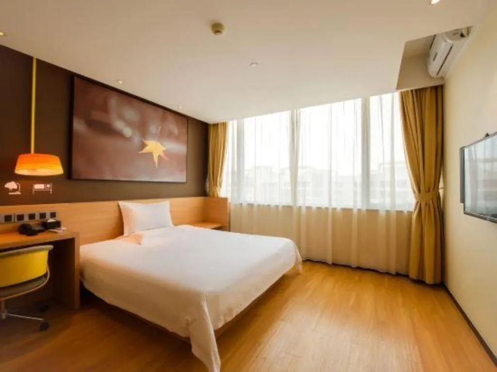 Bed in IU Hotel·Tianjin Binhai New District Yanghuo Market