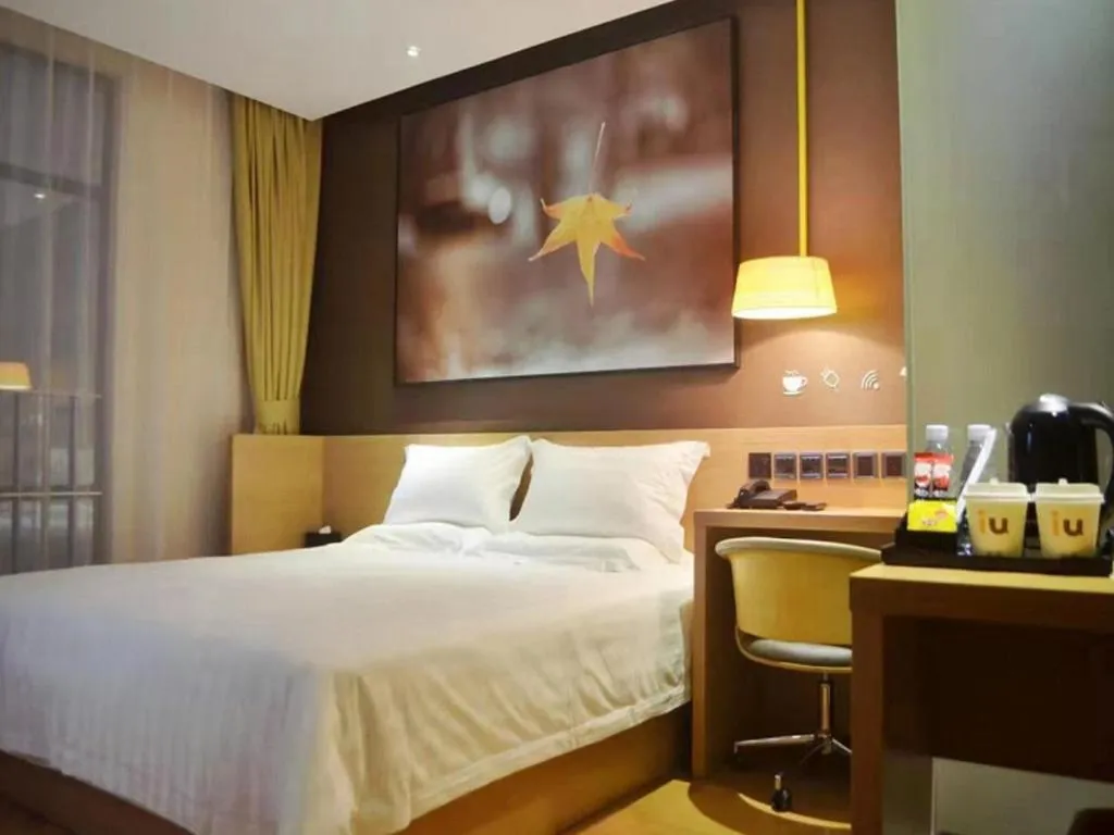 Bed in IU Hotel·Tianjin Binhai New District Yanghuo Market