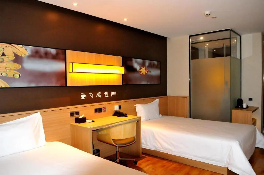 Bed in IU Hotel·Tianjin Binhai New District Yanghuo Market