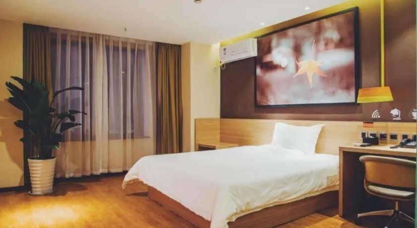 Bed in IU Hotel·Tianjin Binhai New District Yanghuo Market