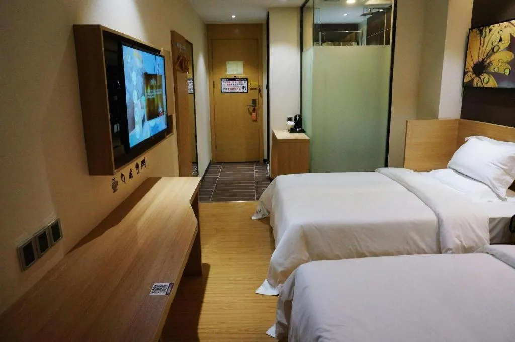 Bed in IU Hotel·Tianjin Binhai New District Yanghuo Market