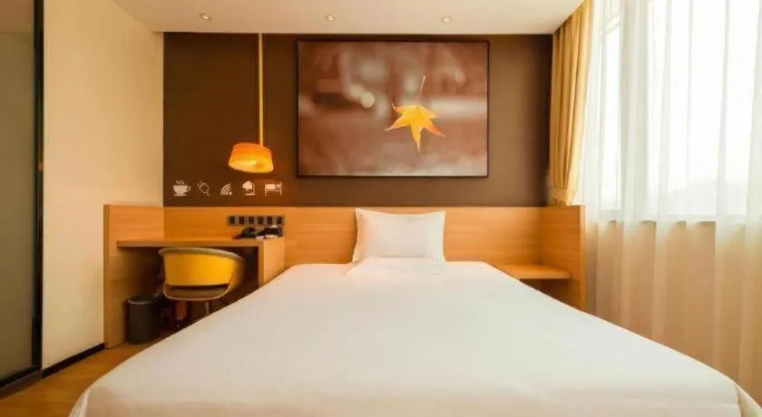 Bed in IU Hotel·Tianjin Binhai New District Yanghuo Market