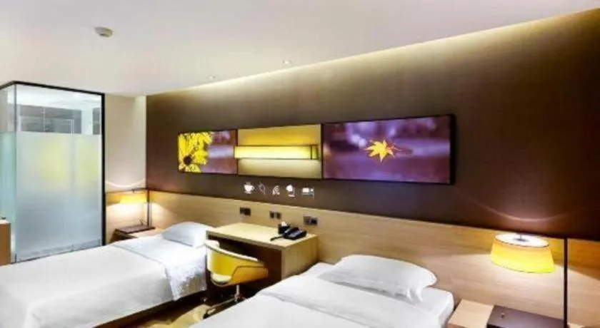Bed in IU Hotel·Tianjin Binhai New District Yanghuo Market