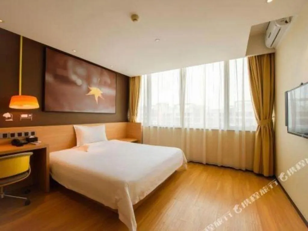 Bed in IU Hotel·Tianjin Binhai New District Yanghuo Market