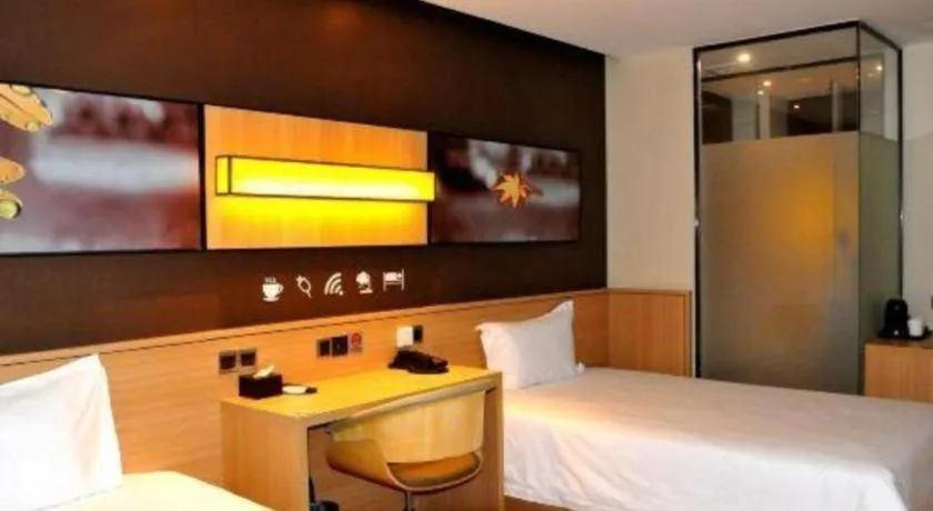 Bed in IU Hotel·Tianjin Binhai New District Yanghuo Market