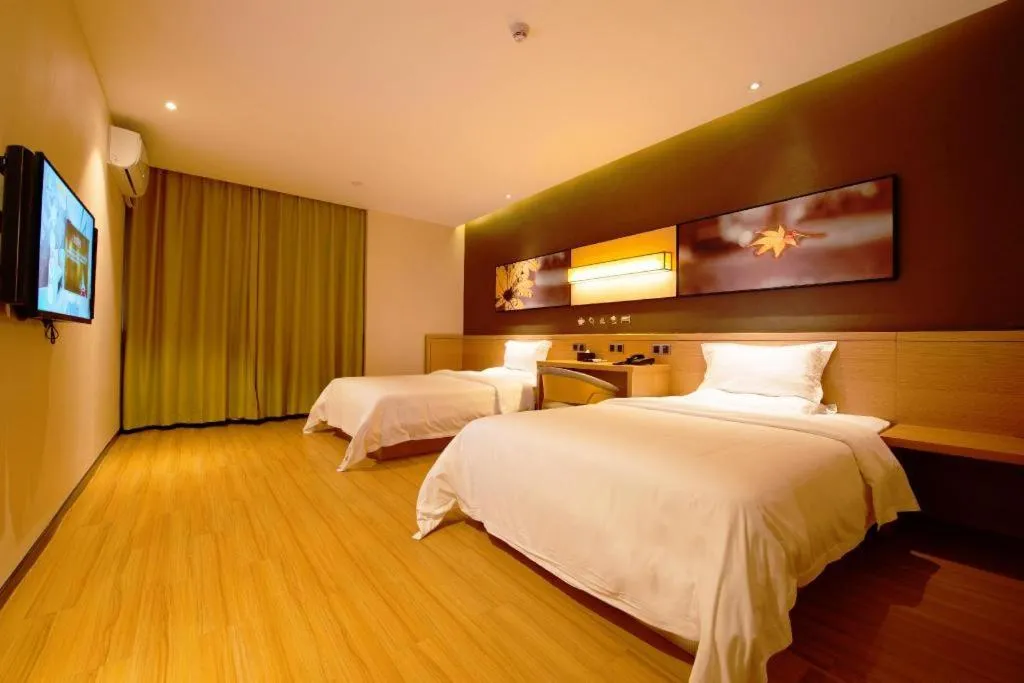 Bed in IU Hotel·Tianjin Binhai New District Yanghuo Market