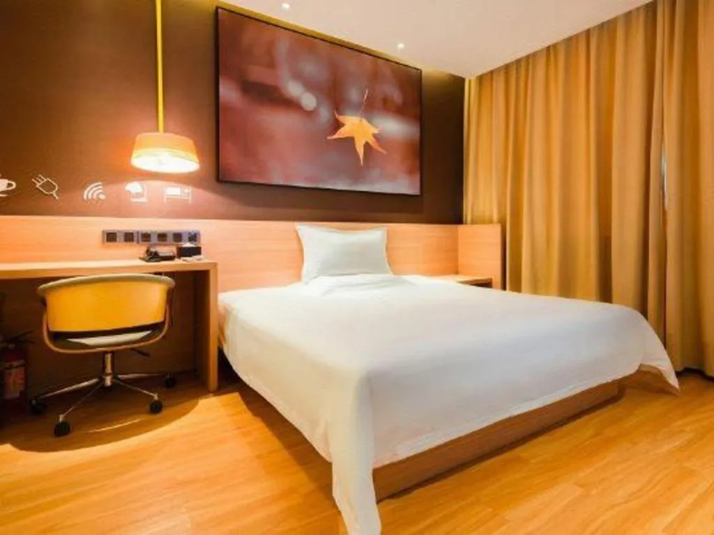 Bed in IU Hotel·Tianjin Binhai New District Yanghuo Market
