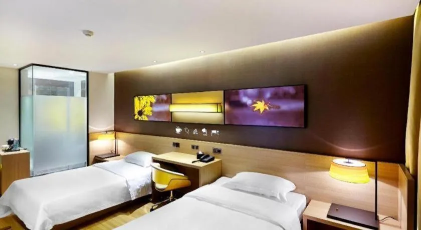 Bed in IU Hotel·Tianjin Binhai New District Yanghuo Market