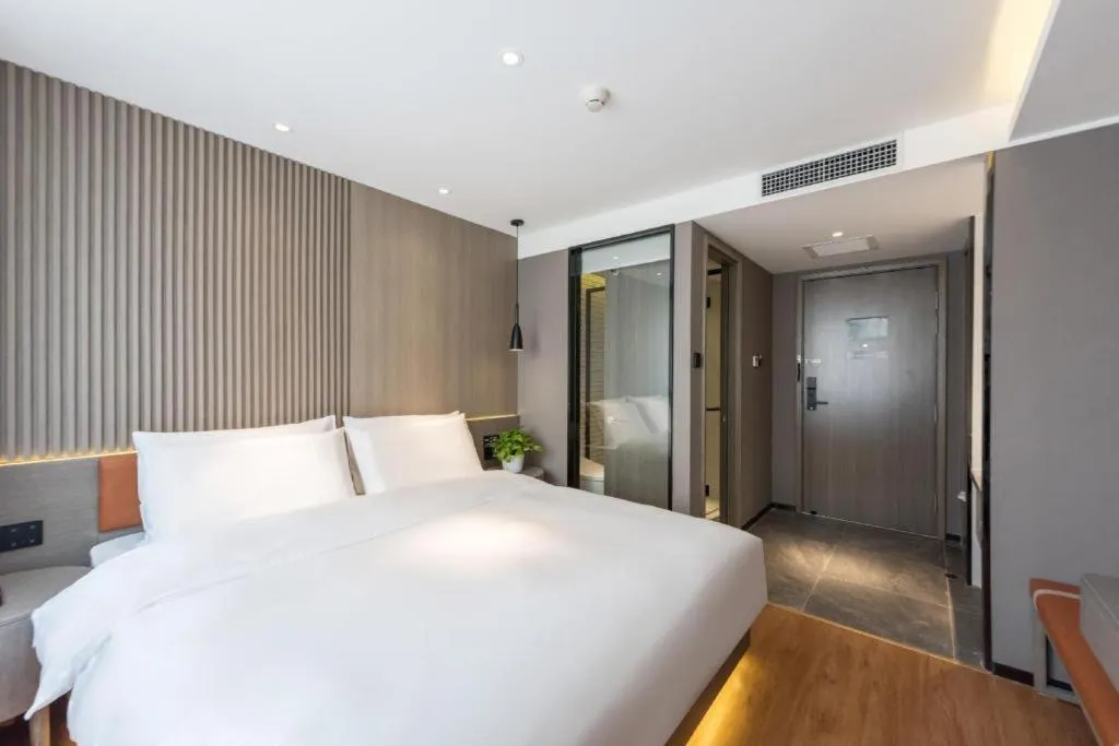 Bed in Zmax Hotel Beijing Wangjing Jiuxianqiao Xingji Bear