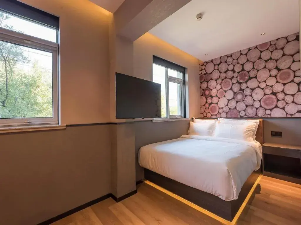 Bed in Zmax Hotel Beijing Wangjing Jiuxianqiao Xingji Bear Bed in Zmax Hotel Beijing Wangjing Jiuxianqiao Xingji Bear