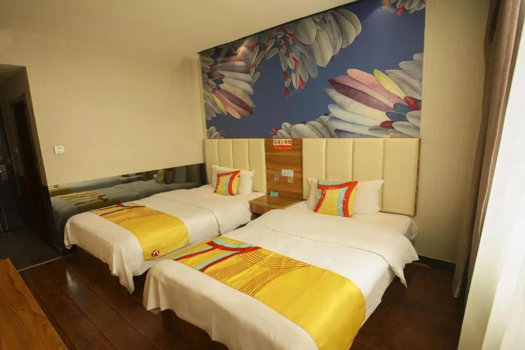 Bed in PAI Hotel Huayin Huashan Mountain Scenic Spot Ancient Street