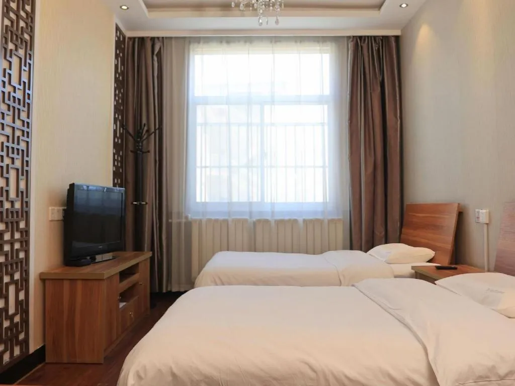 Bed in PAI Hotel Huayin Huashan Mountain Scenic Spot Ancient Street