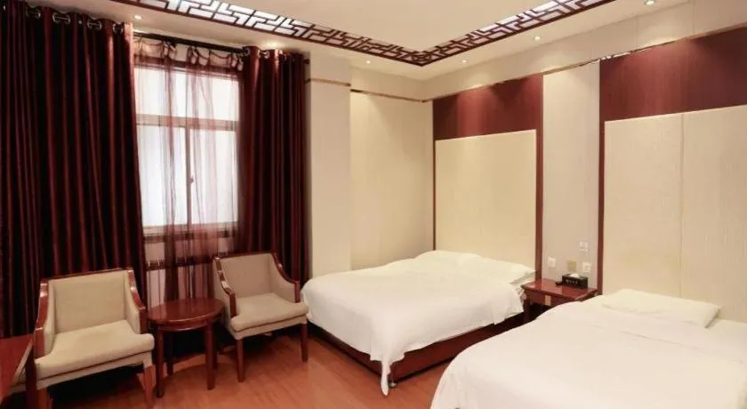 Bed in PAI Hotel Huayin Huashan Mountain Scenic Spot Ancient Street