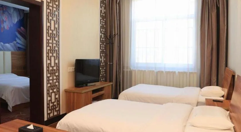 Bed in PAI Hotel Huayin Huashan Mountain Scenic Spot Ancient Street