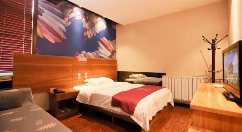 Bed in PAI Hotel Huayin Huashan Mountain Scenic Spot Ancient Street