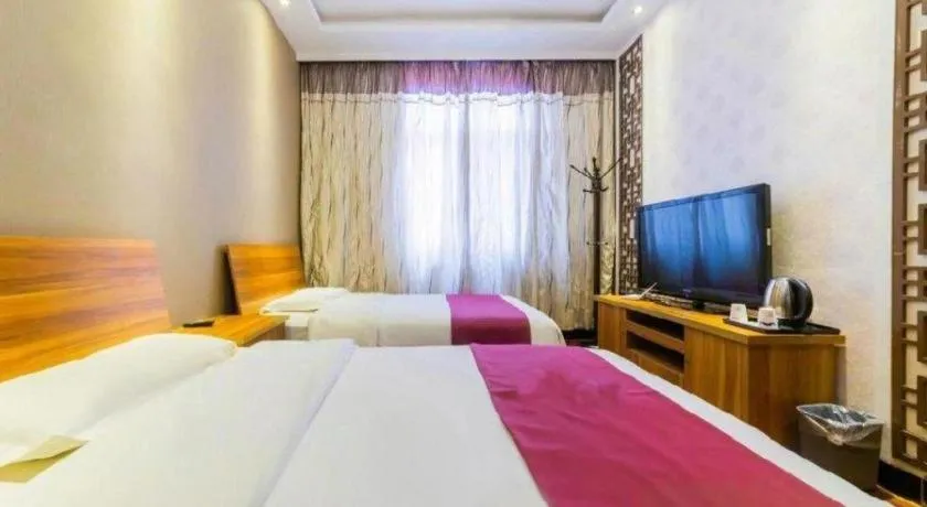 Bed in PAI Hotel Huayin Huashan Mountain Scenic Spot Ancient Street