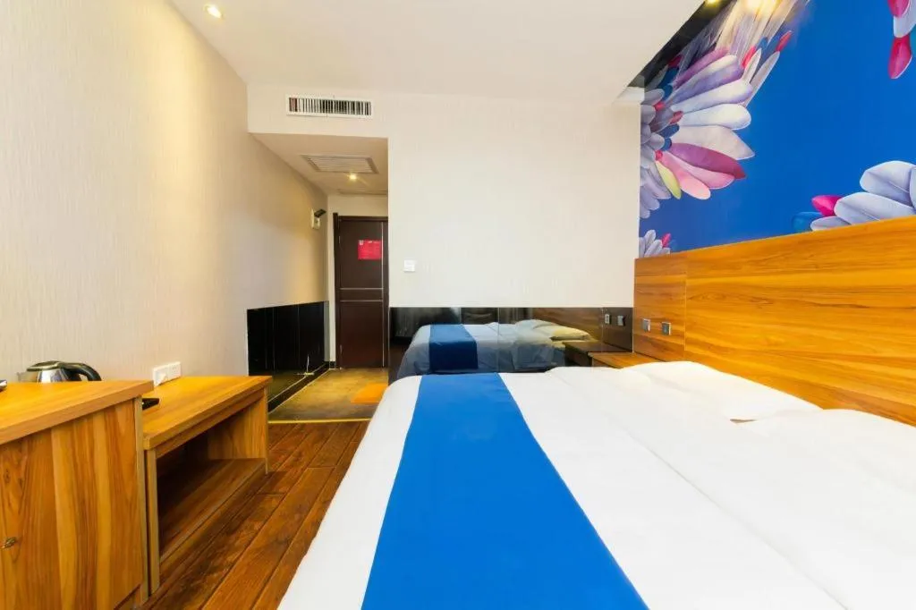 Bed in PAI Hotel Huayin Huashan Mountain Scenic Spot Ancient Street