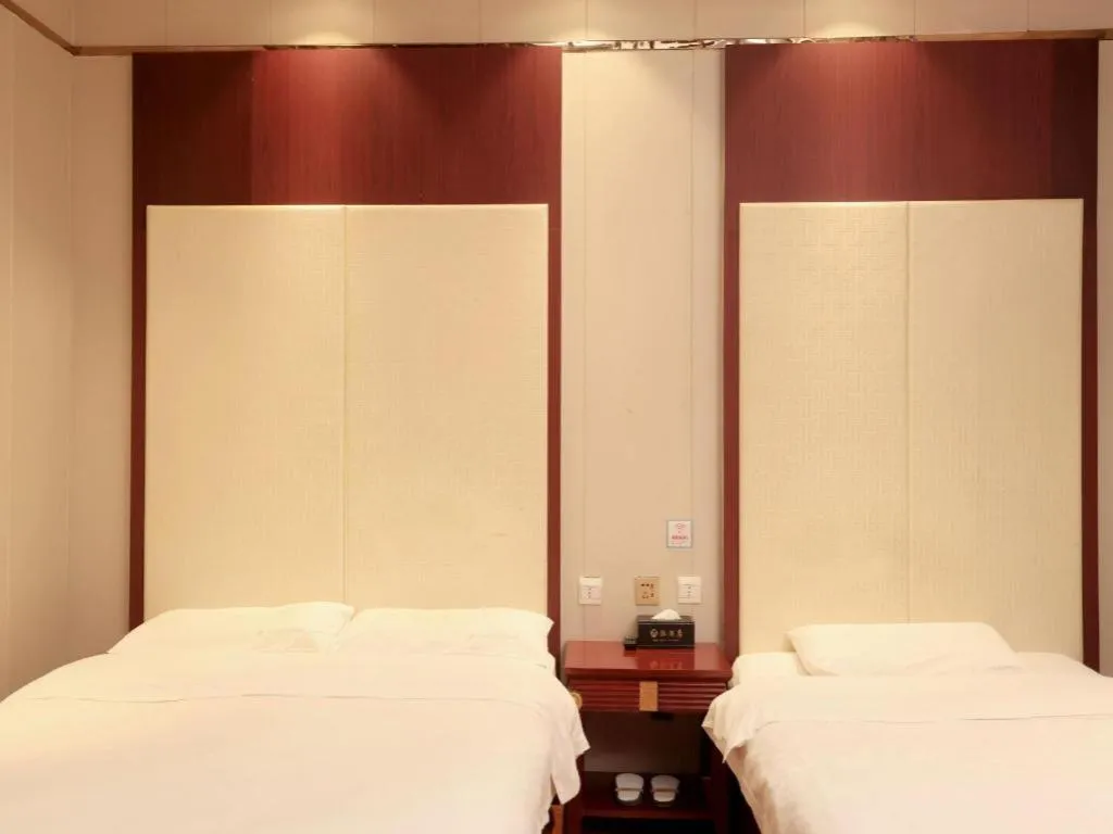 Bed in PAI Hotel Huayin Huashan Mountain Scenic Spot Ancient Street