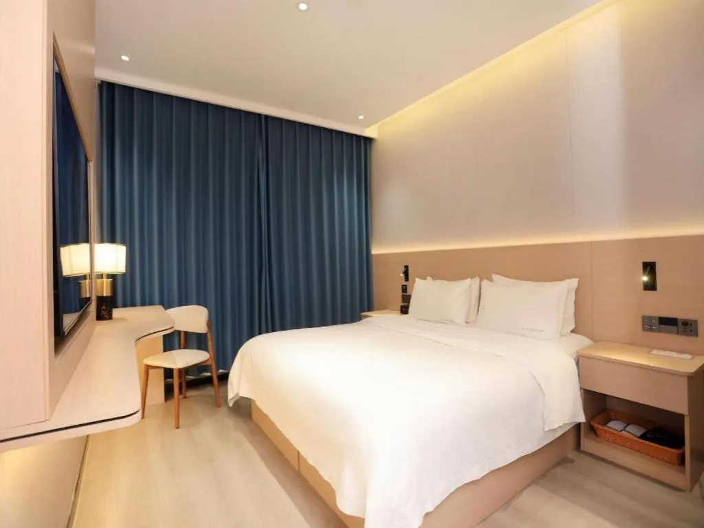 Bed in PAI Hotel Huayin Huashan Mountain Scenic Spot Ancient Street