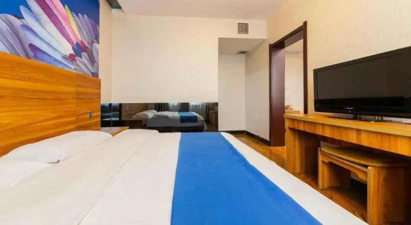 Bed in PAI Hotel Huayin Huashan Mountain Scenic Spot Ancient Street