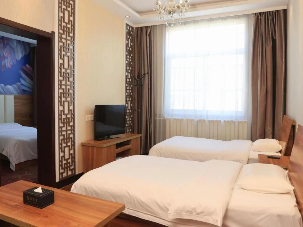 Bed in PAI Hotel Huayin Huashan Mountain Scenic Spot Ancient Street