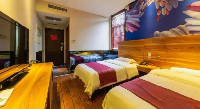 Bed in PAI Hotel Huayin Huashan Mountain Scenic Spot Ancient Street