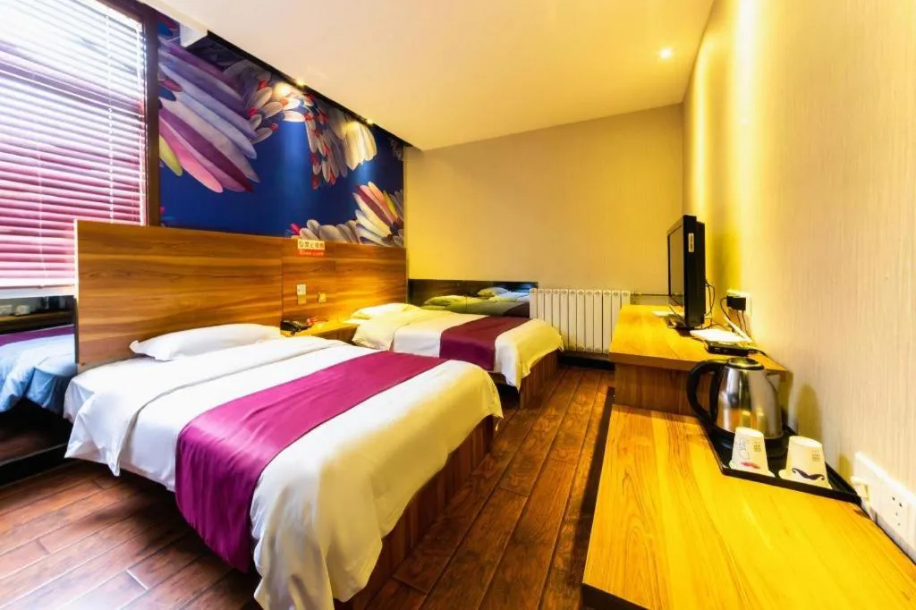 Bed in PAI Hotel Huayin Huashan Mountain Scenic Spot Ancient Street