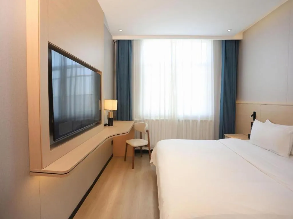 Bed in PAI Hotel Huayin Huashan Mountain Scenic Spot Ancient Street