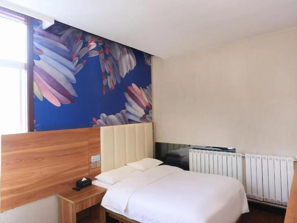 Bed in PAI Hotel Huayin Huashan Mountain Scenic Spot Ancient Street