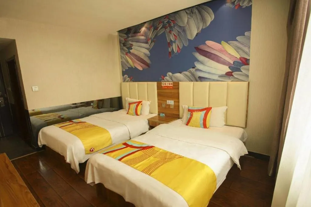 Bed in PAI Hotel Huayin Huashan Mountain Scenic Spot Ancient Street