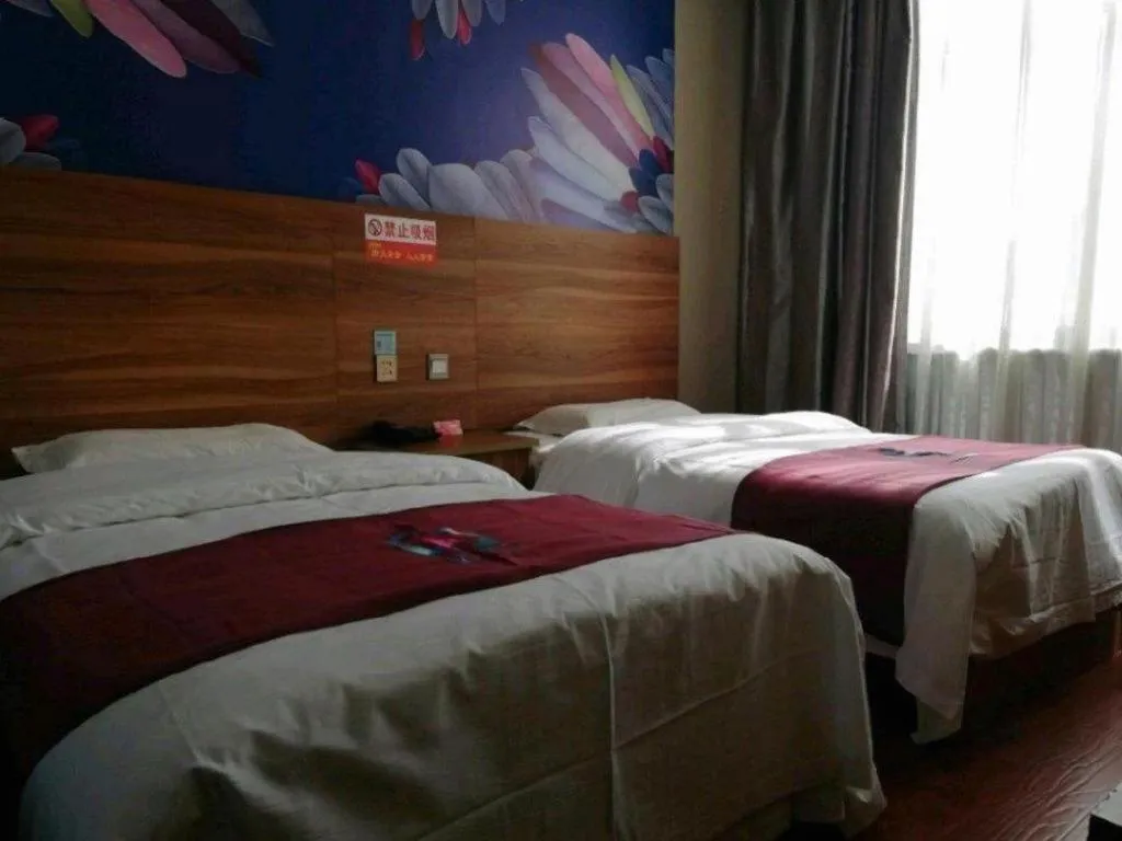 Bed in PAI Hotel Huayin Huashan Mountain Scenic Spot Ancient Street