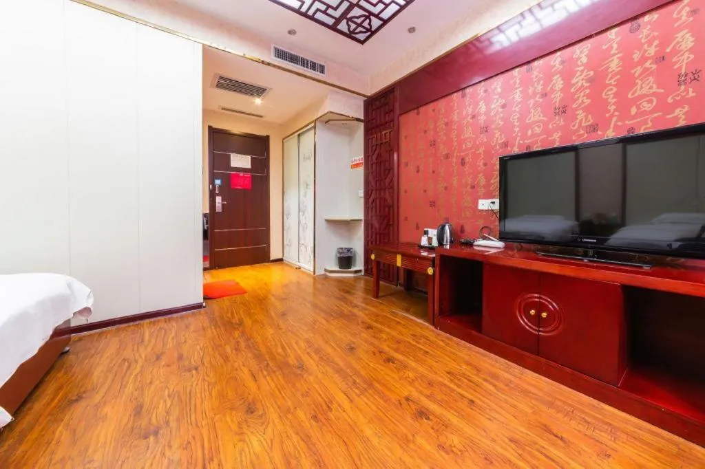 Bed in PAI Hotel Huayin Huashan Mountain Scenic Spot Ancient Street