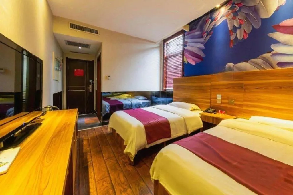 Bed in PAI Hotel Huayin Huashan Mountain Scenic Spot Ancient Street