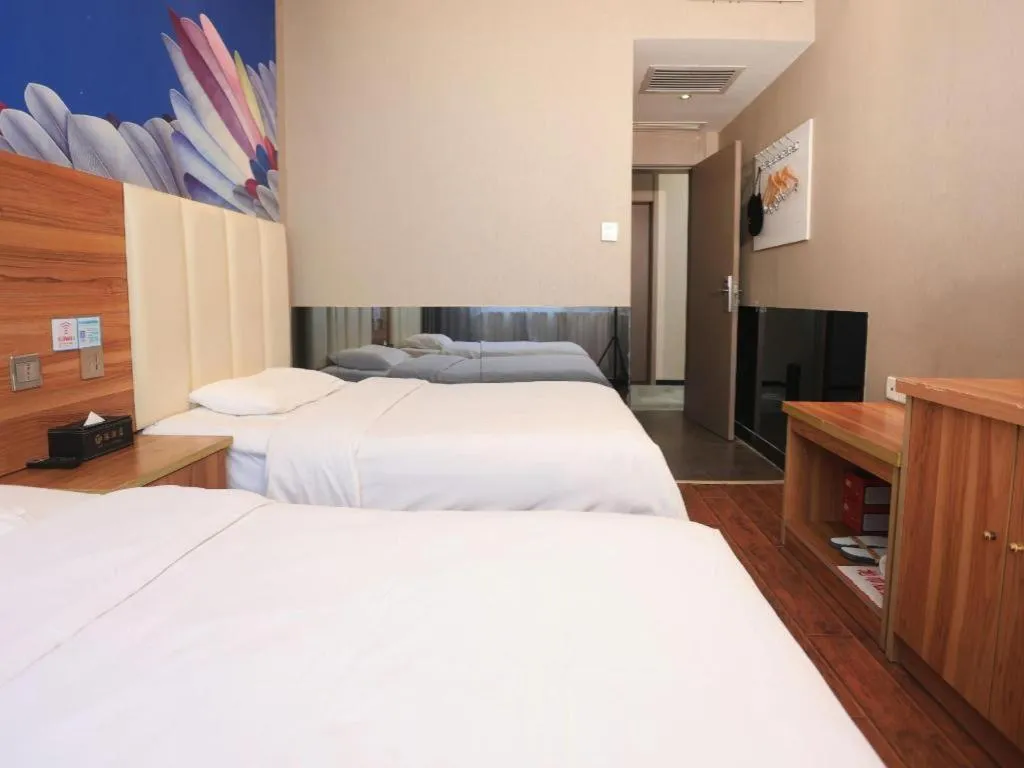 Bed in PAI Hotel Huayin Huashan Mountain Scenic Spot Ancient Street