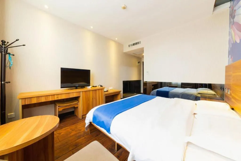 Bed in PAI Hotel Huayin Huashan Mountain Scenic Spot Ancient Street