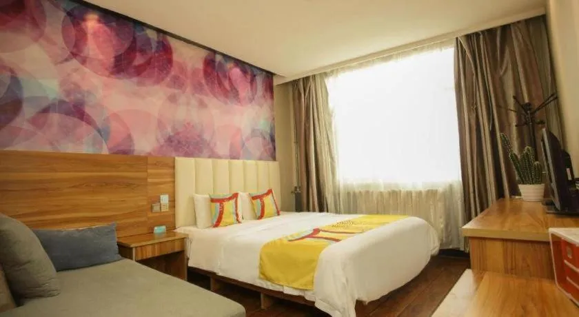 Bed in PAI Hotel Huayin Huashan Mountain Scenic Spot Ancient Street